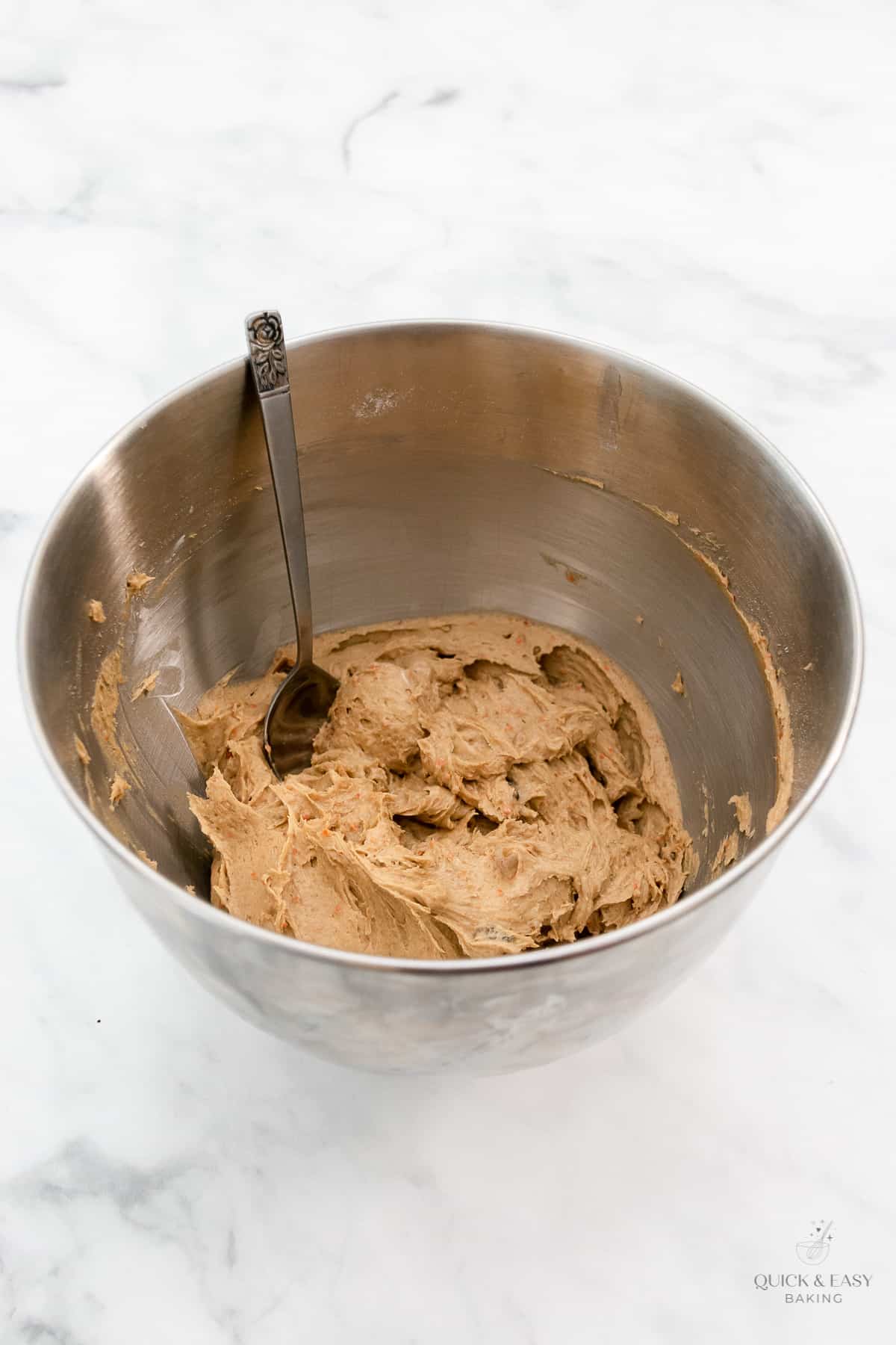 Cookie dough in mixing bowl.