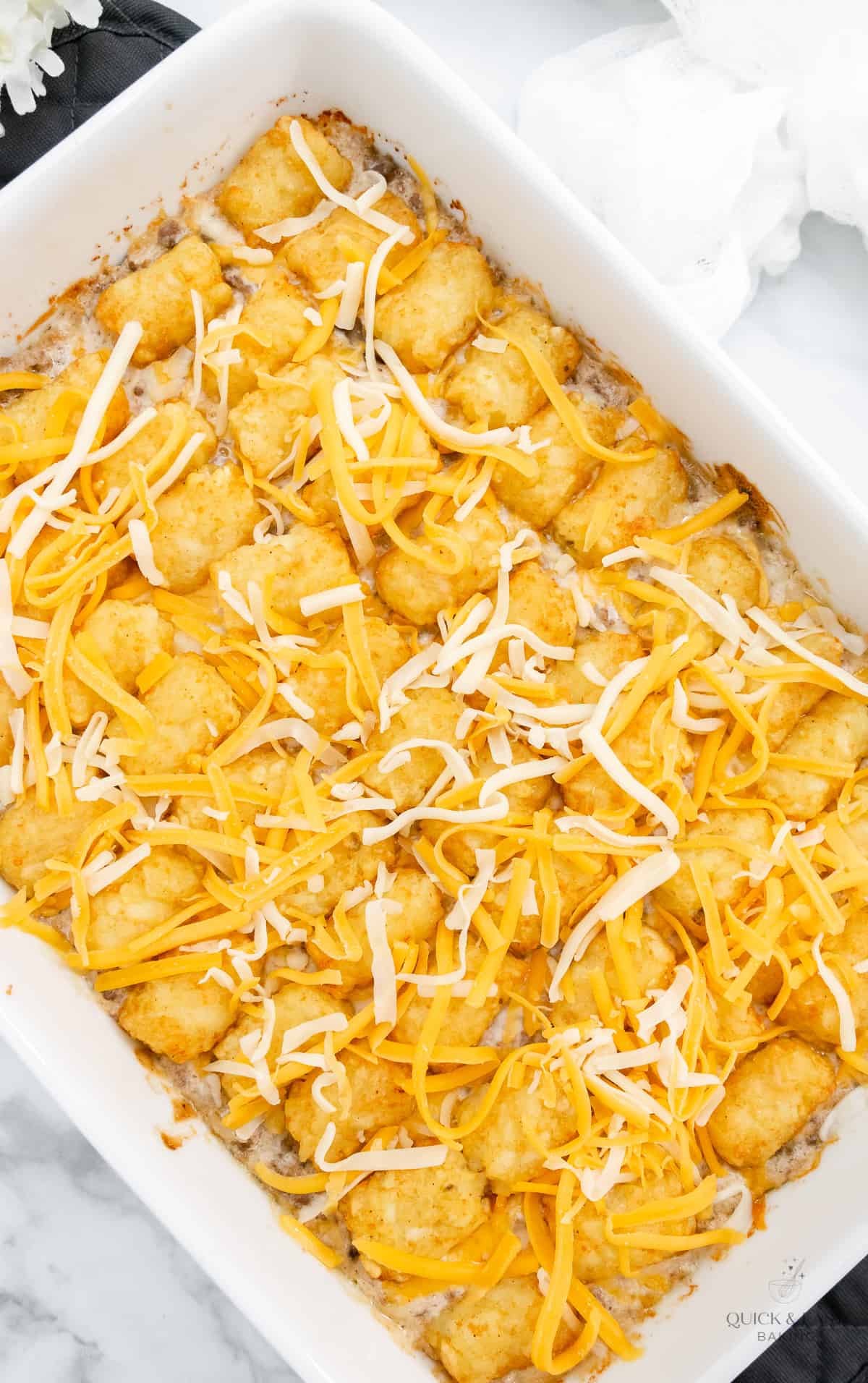 Top view of casserole with cheese sprinkled on.