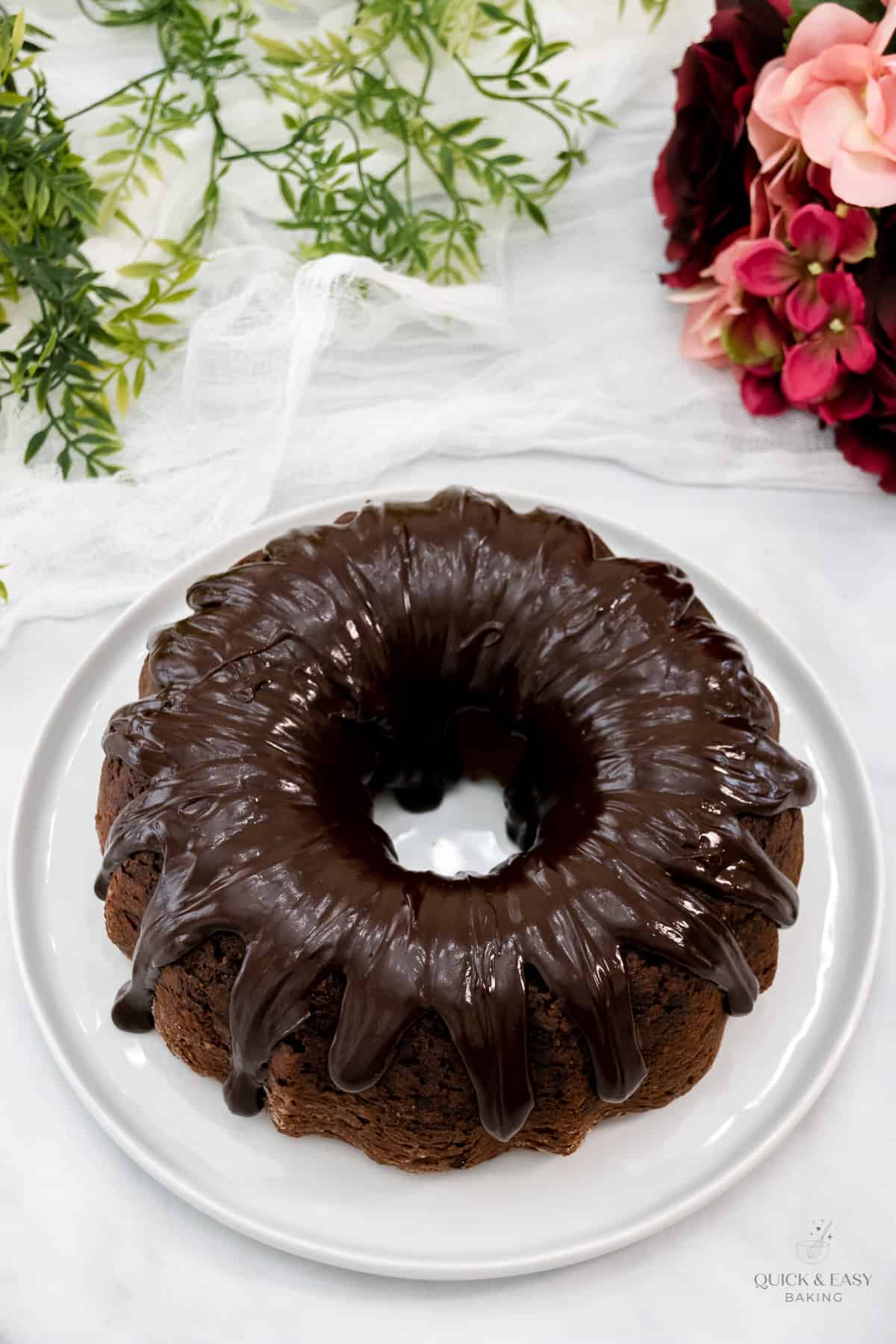 Top view of chocolate cake with chocolate glaze poured on top.