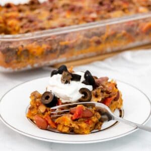 Featured image of casserole with beans and fritos.