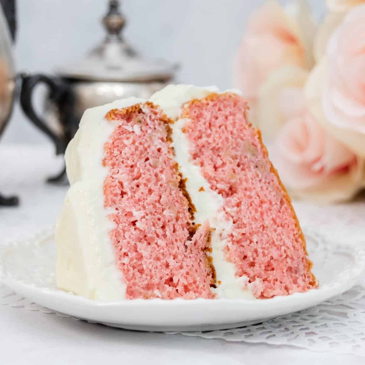 Featured image of strawberry layer cake with bananas and cream cheese.