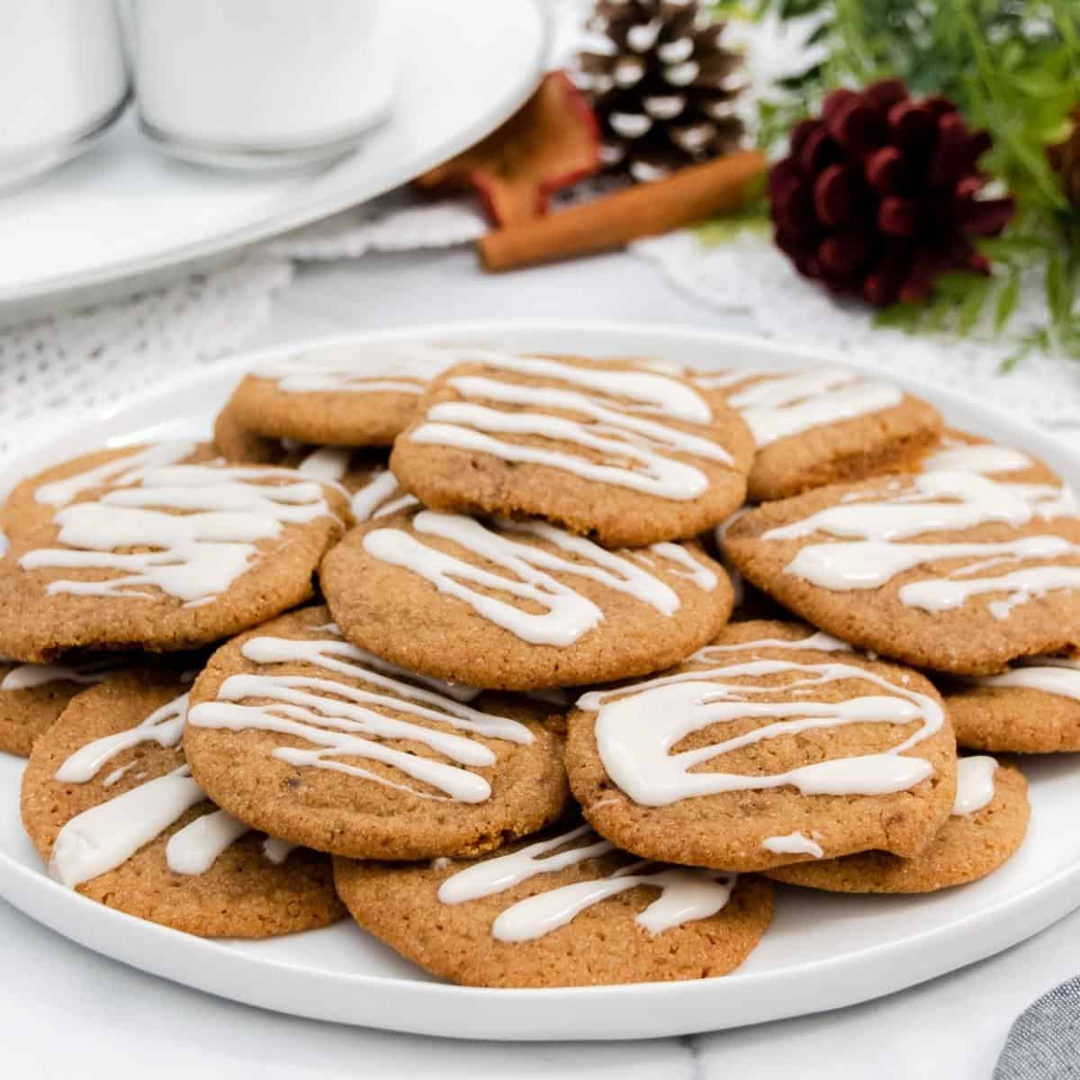 Soft gingerbread cookies on a plate featured image.