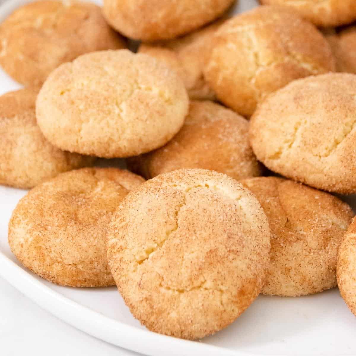 Close up of snickerdoodle cookies on a platter featured image.