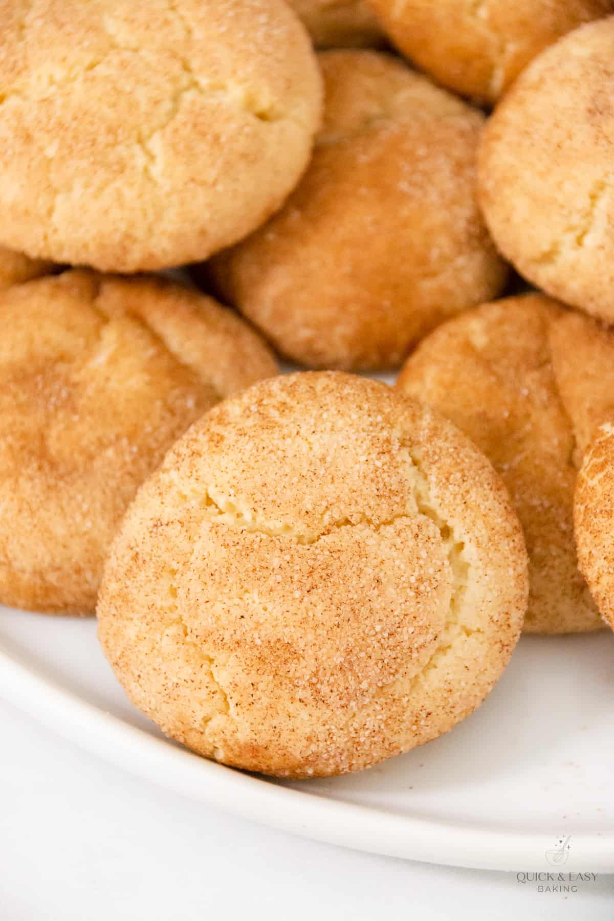 Close up of cinnamon sugar coated cookies on a platter.