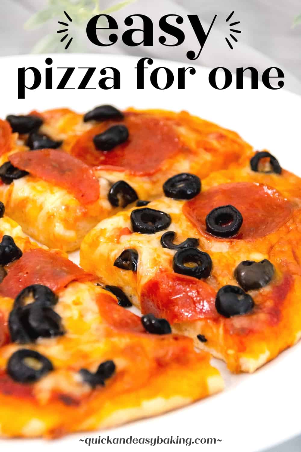 Pinterest image with close up of homemade small pizza with text overlay.