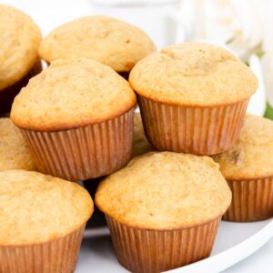 Close up of banana cupcakes on a white platter featured image.