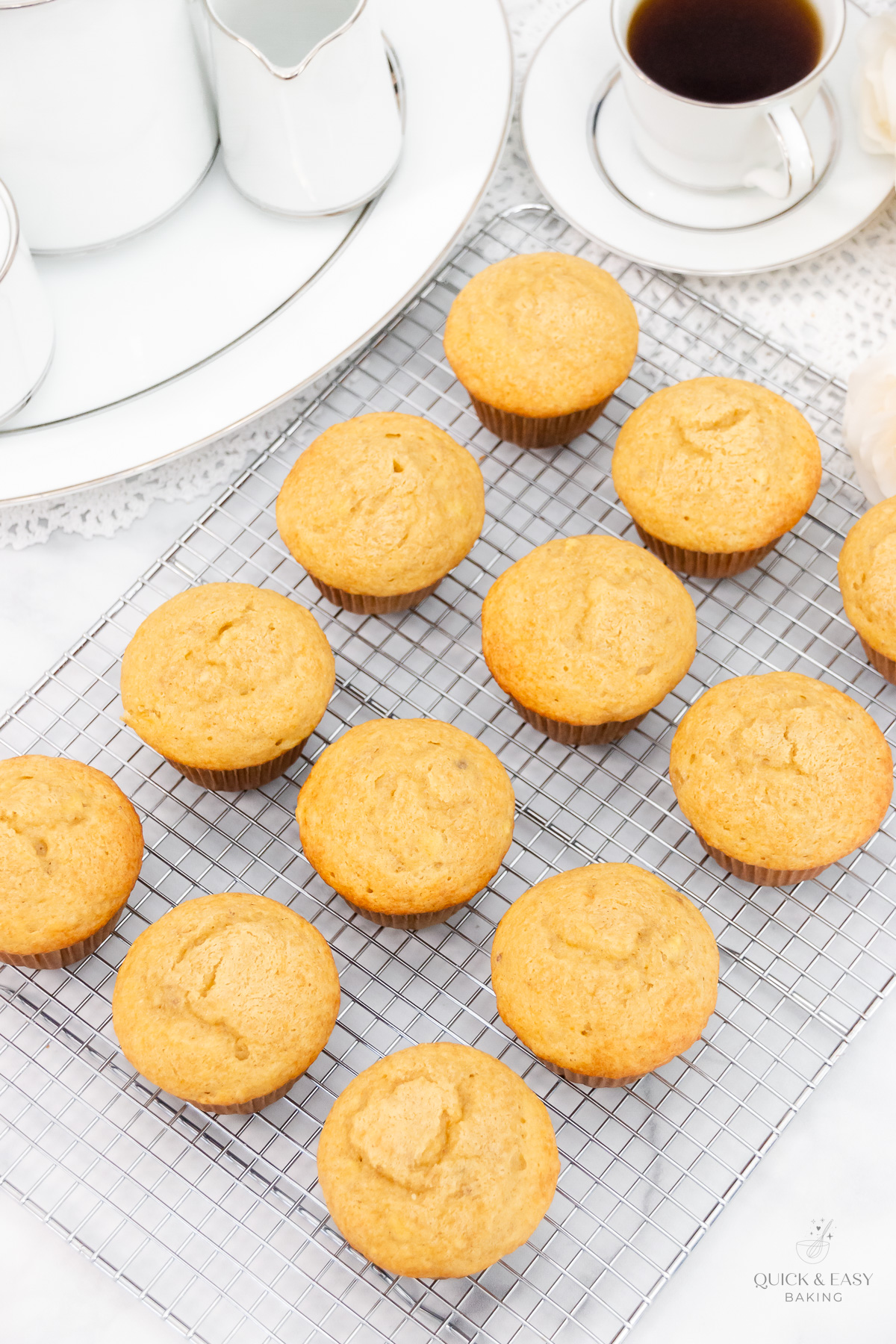 Top view of cooling banana muffins on a wire cooling rack.