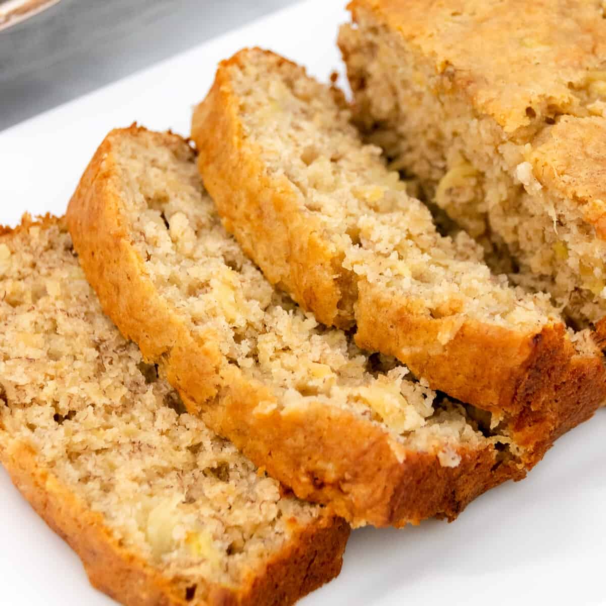 Top view of moist banana bread with pineapple.
