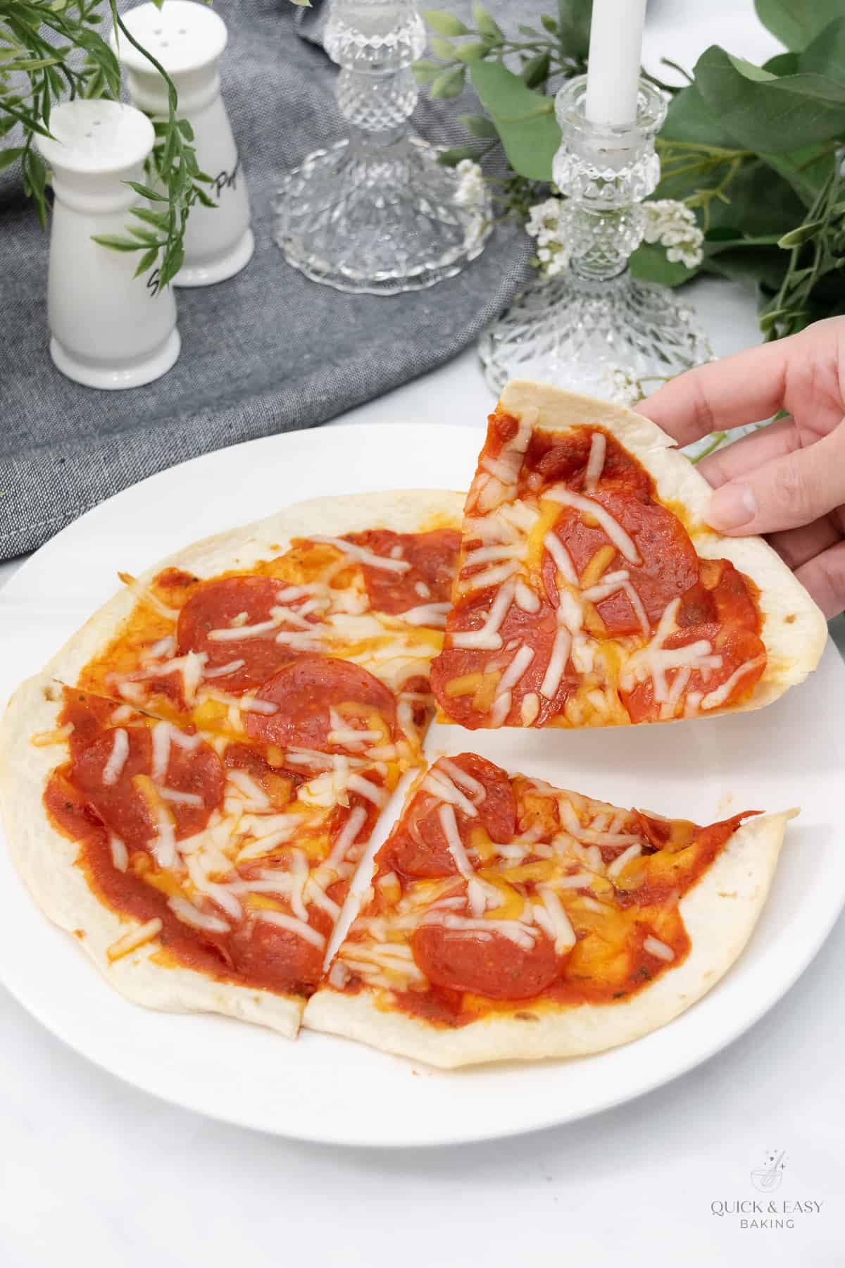 Top down image of mini pizza made with tortilla.