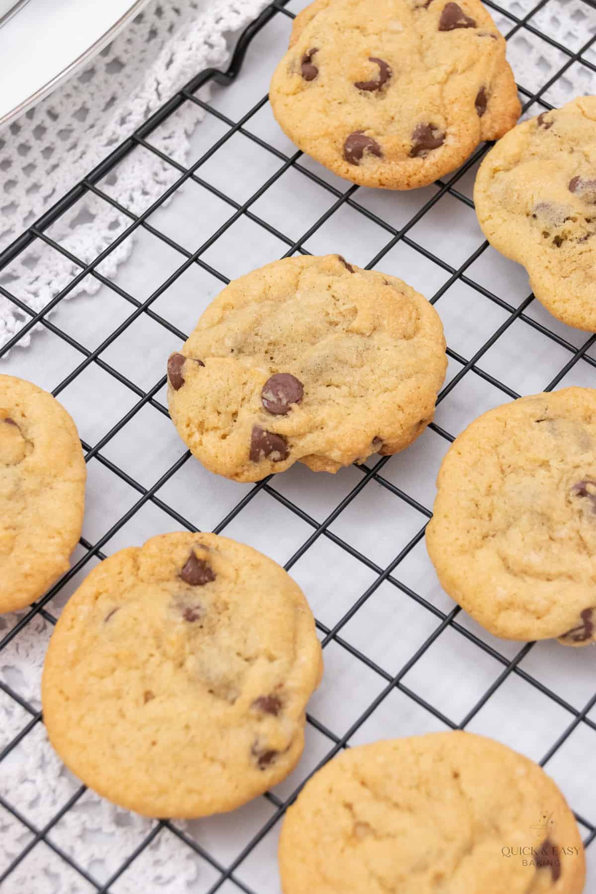 Top view of cooling chocolate chip cookies on a cooling rack.